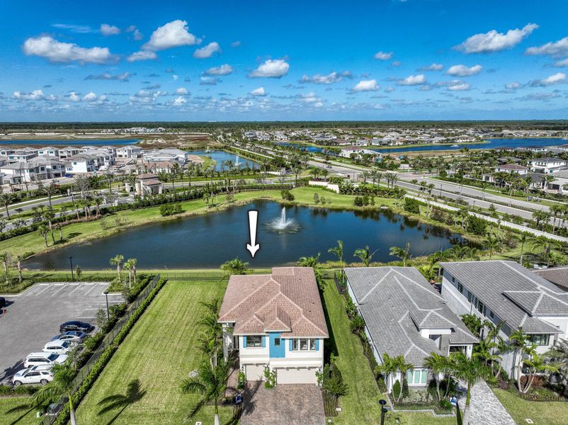 Front exterior of a new home in Apex at Avenir, Palm Beach Gardens, FL, highlighting curb appeal (Image 2).