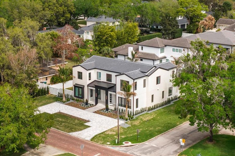 Front exterior of a new home in , Winter Park, FL, highlighting curb appeal (Image 28). Front exterior of a new home in , Winter Park, FL, highlighting curb appeal (Image 28).