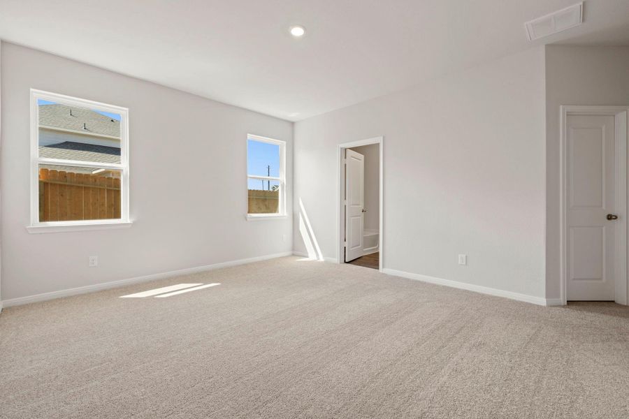 Spacious, unfurnished interior of a new home in Vacek Country Meadows, Richmond (Image 11).