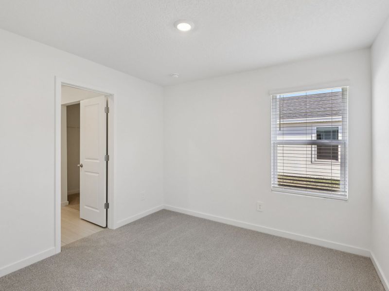 Spacious, unfurnished interior of a new home in Flagler Village - Signature Series, Palm Coast (Image 9).