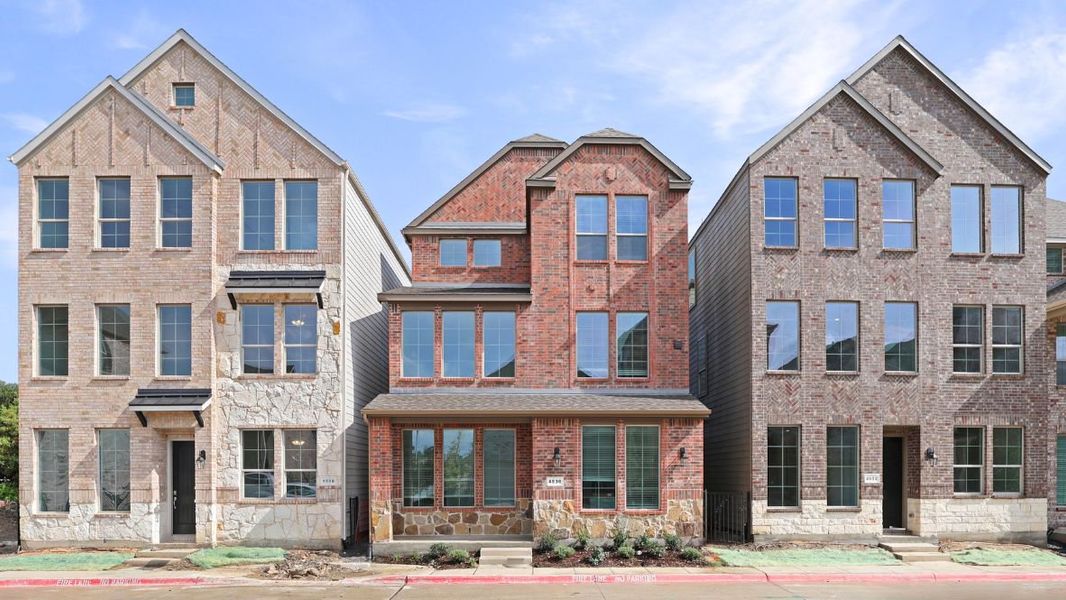 Front exterior of a new home in Mustang Square, Plano, TX, highlighting curb appeal (Image 1). Front exterior of a new home in Mustang Square, Plano, TX, highlighting curb appeal (Image 1).