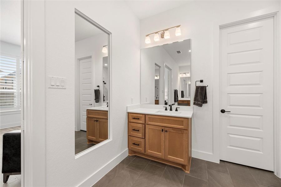 Furnished interior view inside a new home in Bridgeland, Cypress (Image 18).