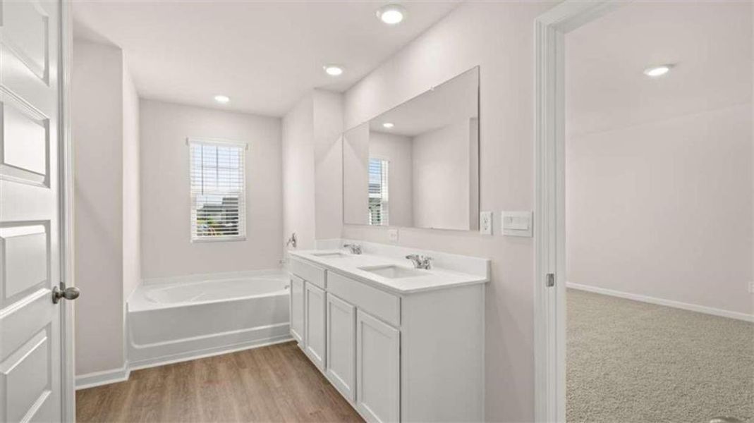 Furnished interior view inside a new home in Preserve at Dove Creek, Statham (Image 16).