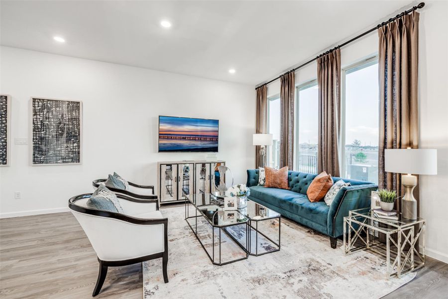 Furnished interior view inside a new home in Bridgeland, Cypress (Image 13).
