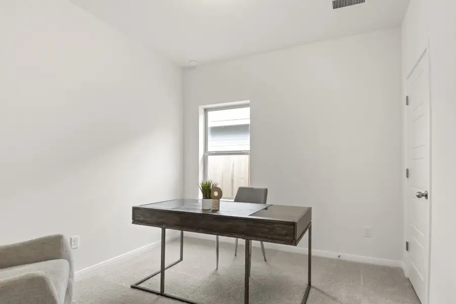 Furnished interior view inside a new home in Trace, San Marcos (Image 3).