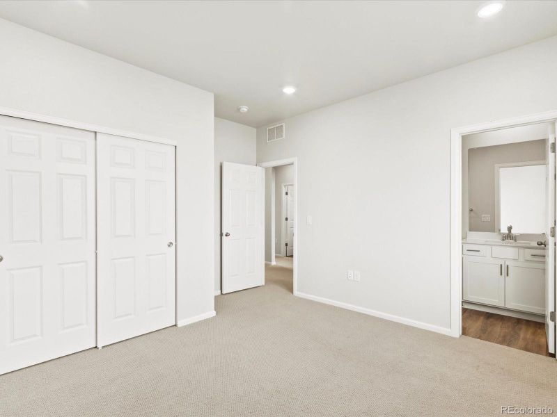 Spacious, unfurnished interior of a new home in Poudre Heights: The Alpine Collection, Windsor (Image 36).