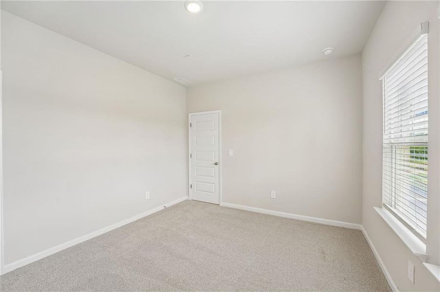 Spacious, unfurnished interior of a new home in Hemingway - Highland Series, Cumming (Image 38).