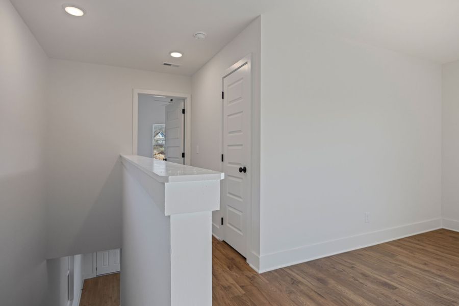 Representative unfurnished interior of a home built from the Fontaine Townhome by Parkside Builders in The Parks of Mill Town, Chattanooga (Image 23).