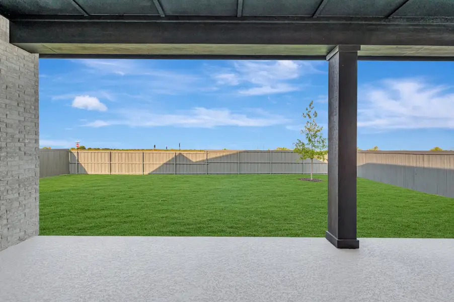 Exterior details and patio area of a home in Goodland – Manor Series, Grand Prairie (Image 4). Exterior details and patio area of a home in Goodland – Manor Series, Grand Prairie (Image 4).