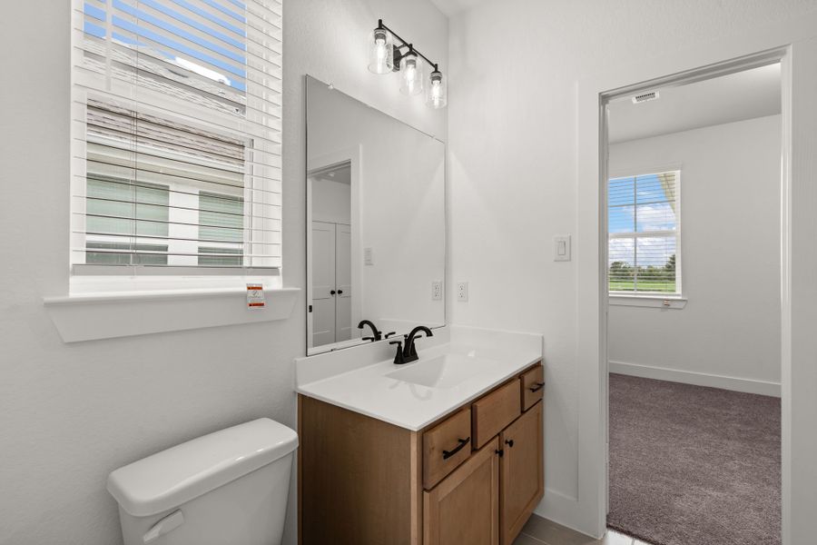 Furnished interior view inside a new home in Meridiana, Manvel (Image 5).