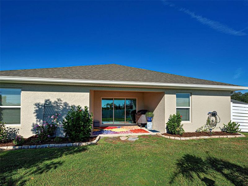 Exterior details and patio area of a home in Watercress Cove, North Port (Image 28).