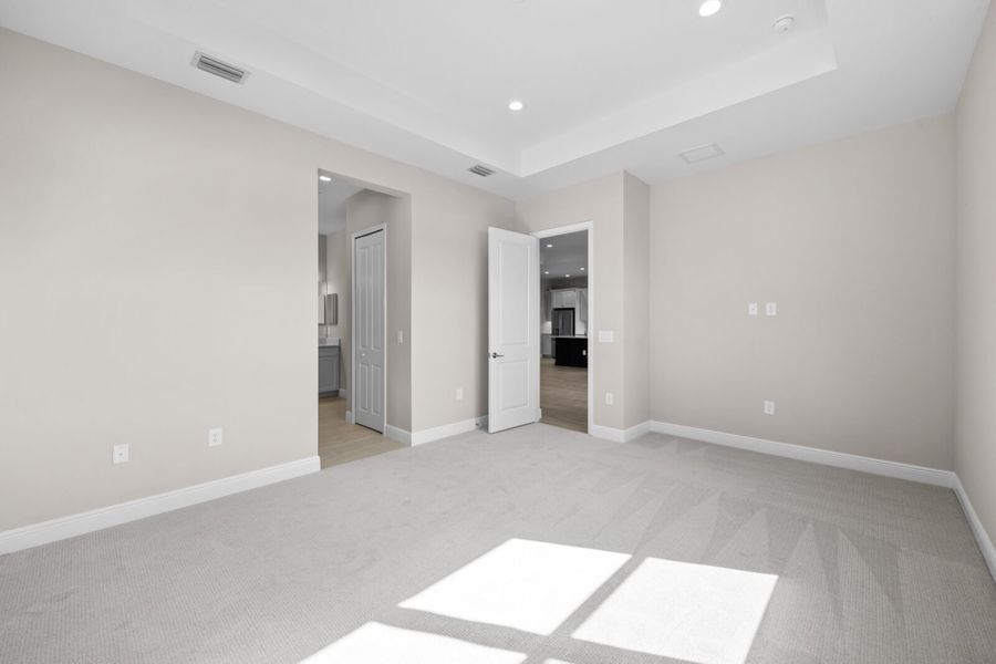 Spacious, unfurnished interior of a new home in SkySail, Naples (Image 11).