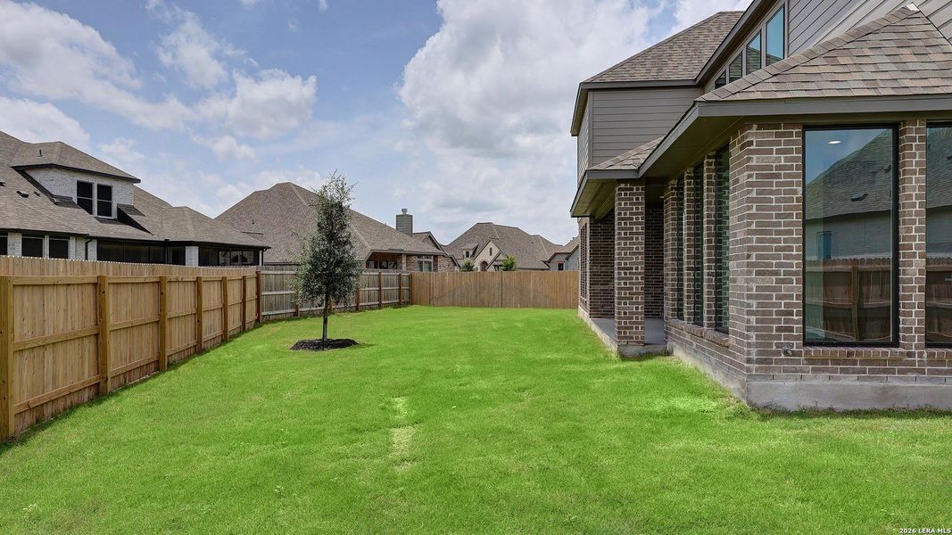 Exterior details and patio area of a home in Alsatian Oaks, Castroville (Image 3).