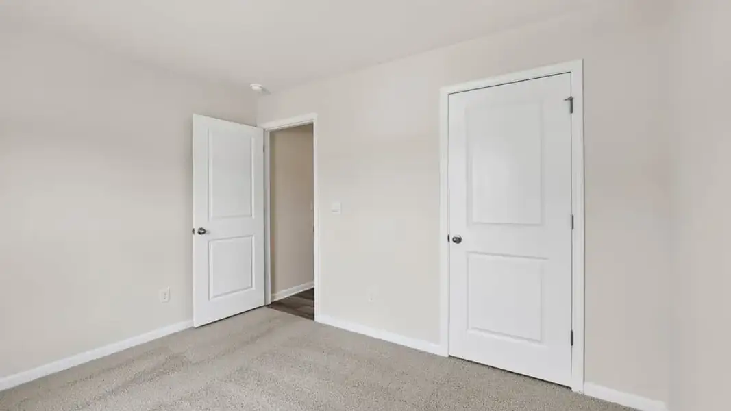 Spacious, unfurnished interior of a new home in Waverly Station, Greenwood (Image 18).