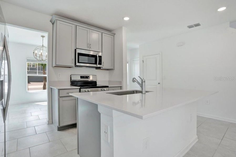 Furnished interior view inside a new home in Wellness Ridge, Clermont (Image 5).