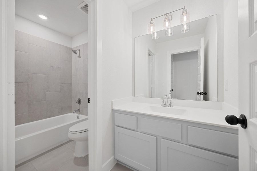 Furnished interior view inside a new home in The Colony, Bastrop (Image 13).