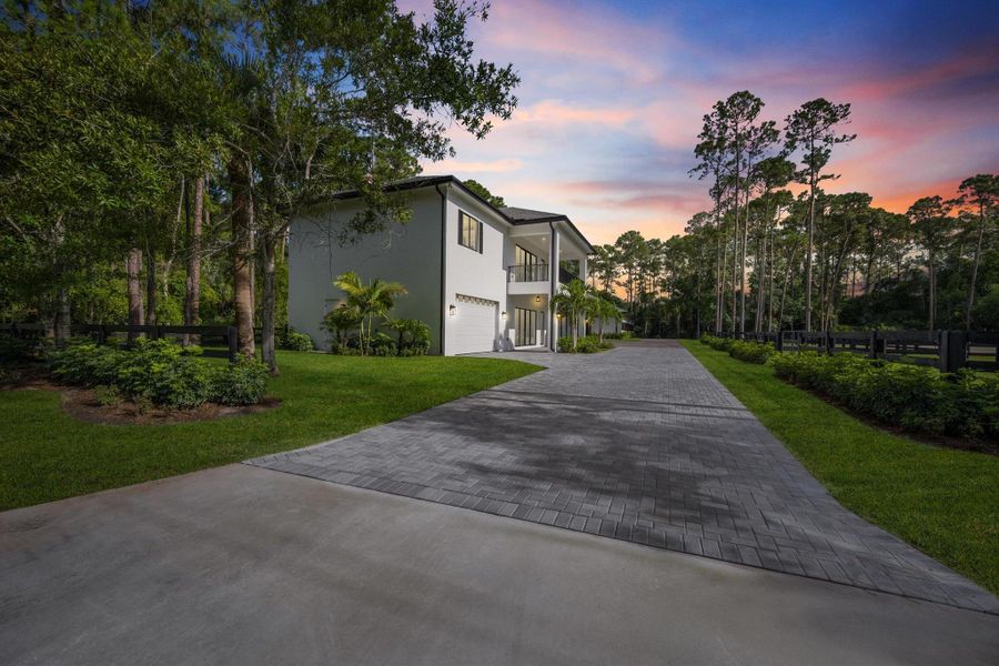 Front exterior of a new home in , Wellington, FL, highlighting curb appeal (Image 27).