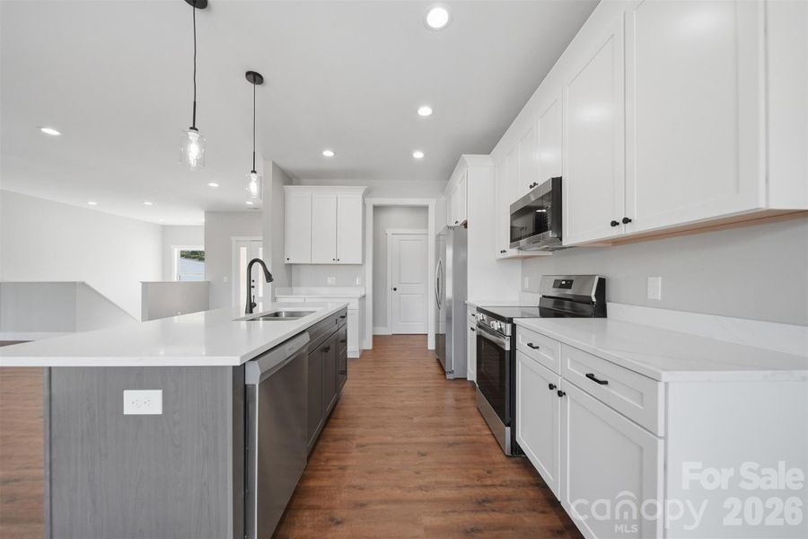 Furnished interior view inside a new home in , Lenoir (Image 10).