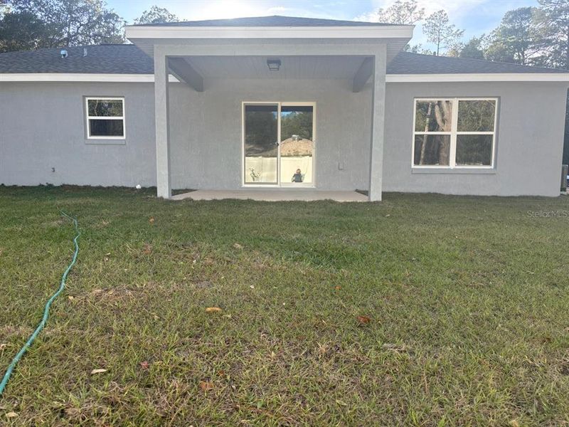 Front exterior of a new home in , Dunnellon, FL, highlighting curb appeal (Image 2).