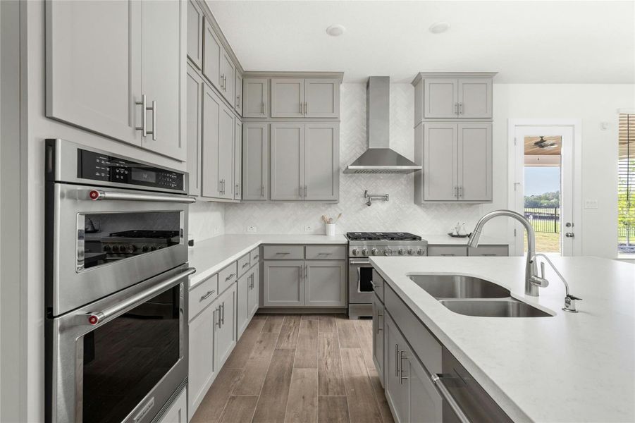 Furnished interior view inside a new home in Rough Hollow, Lakeway (Image 7).