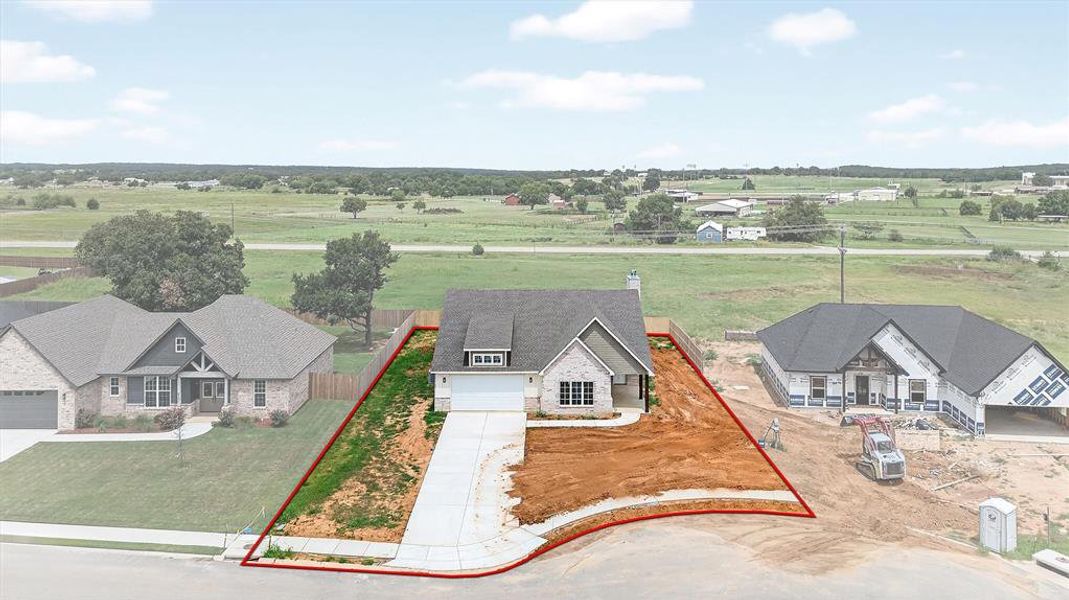 Front exterior of a new home in , Callisburg, TX, highlighting curb appeal (Image 18).