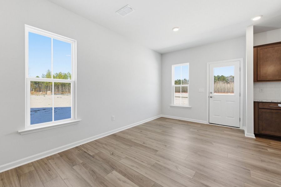 Spacious, unfurnished interior of a new home in Poets Walk, Whitsett (Image 25).