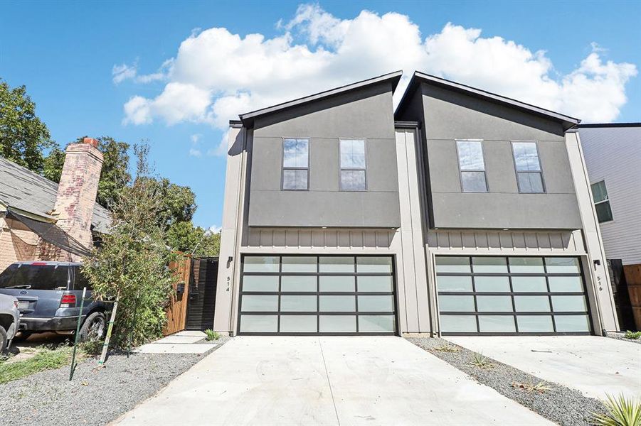 View of front of property with a garage