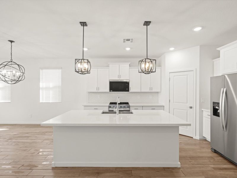 Furnished interior view inside a new home in Silva Farms - Estate Series, Goodyear (Image 4). Furnished interior view inside a new home in Silva Farms - Estate Series, Goodyear (Image 4).