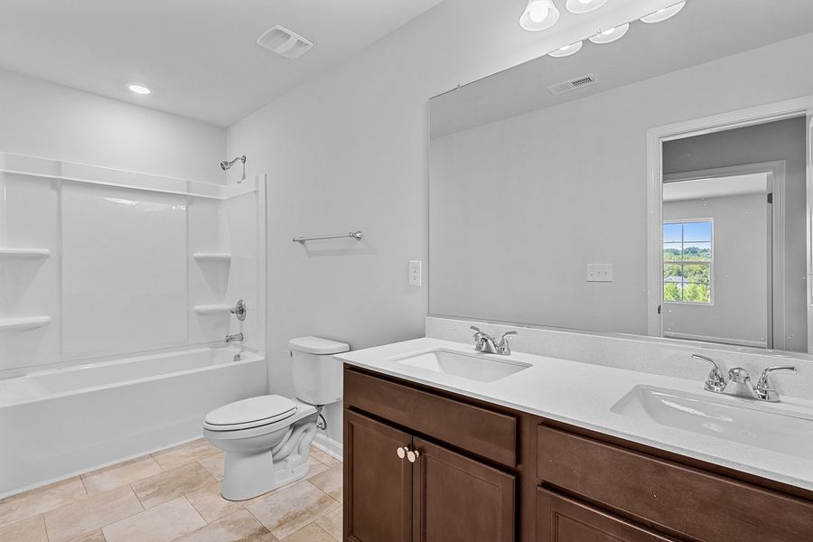 Furnished interior view inside a new home in Hanes Lake, Winston-Salem (Image 17). Furnished interior view inside a new home in Hanes Lake, Winston-Salem (Image 17).