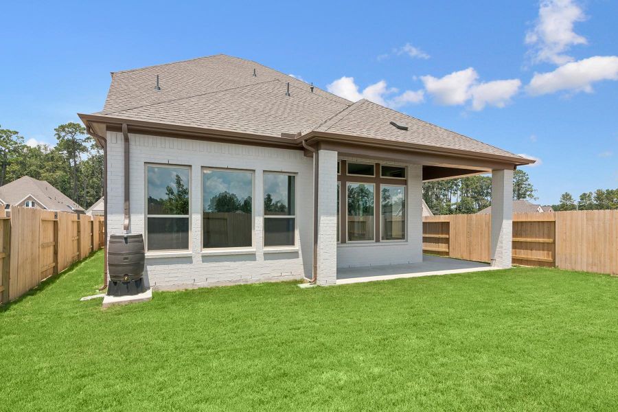 Exterior details and patio area of a home in ARTAVIA 45' Homesites, Conroe (Image 24).