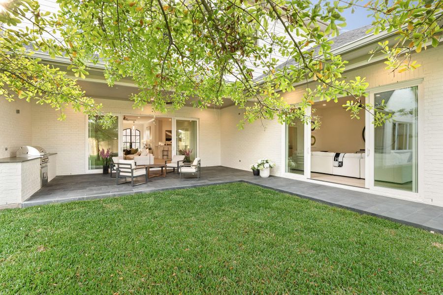 Exterior details and patio area of a home in , Houston (Image 25).