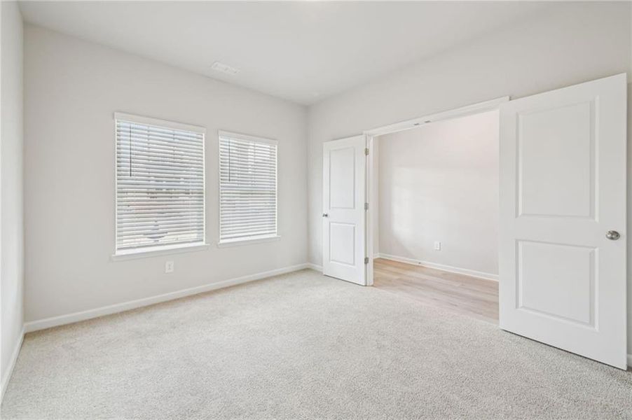 Spacious, unfurnished interior of a new home in Creekside at Oxford Park, Fairburn (Image 60).