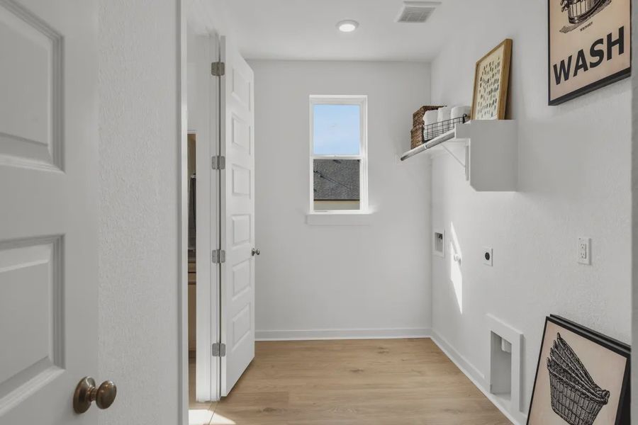 Representative furnished interior of a home built from the Mariah by Chesmar Homes in Grange, Katy (Image 26).