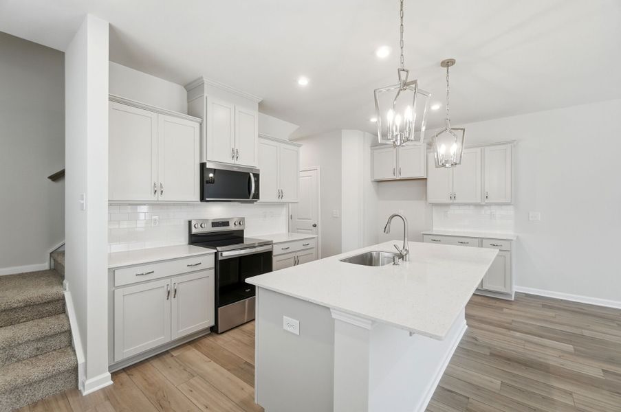 Furnished interior view inside a new home in Stonesummit at Reedy Creek, Charlotte (Image 8).