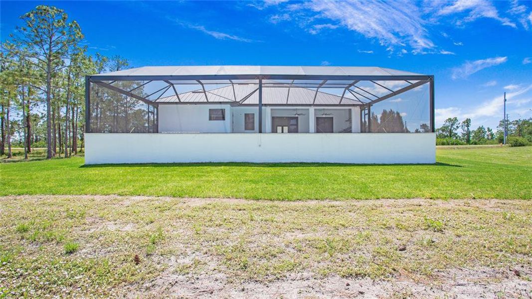 Exterior details and patio area of a home in , Naples (Image 34). Exterior details and patio area of a home in , Naples (Image 34).