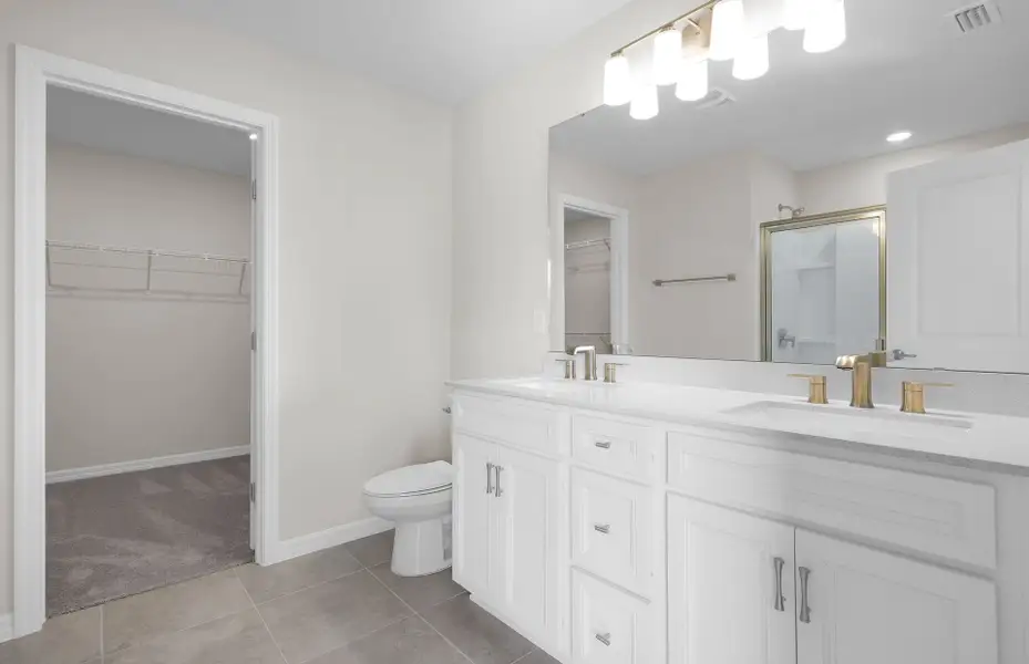 Furnished interior in a model home at Murray Farms in Middleburg (Image 4).