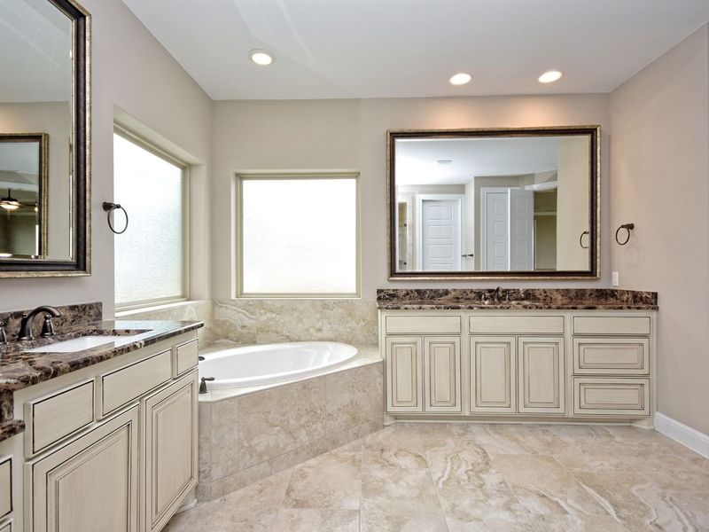 Representative furnished interior of a home built from the Madera II by Giddens Homes in Scofield Farms Estates, Georgetown (Image 208).