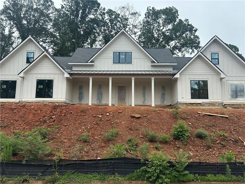 Front exterior of a new home in , Commerce, GA, highlighting curb appeal (Image 7).