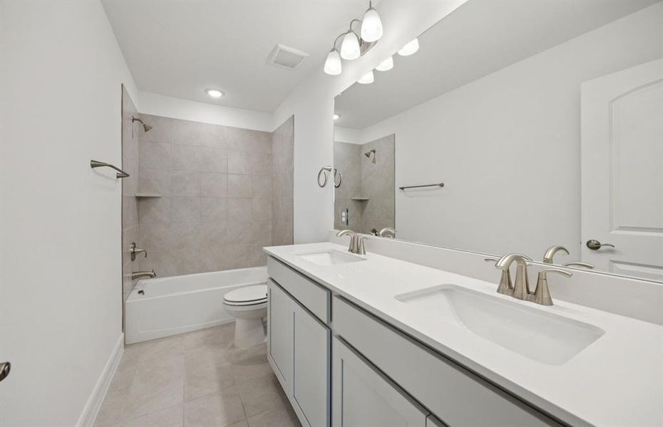 Upgraded secondary bathroom *real home pictured