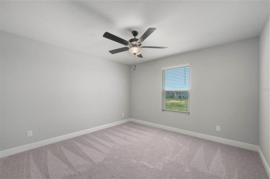 Spacious, unfurnished interior of a new home in Gum Lake Preserve, Lake Alfred (Image 28).