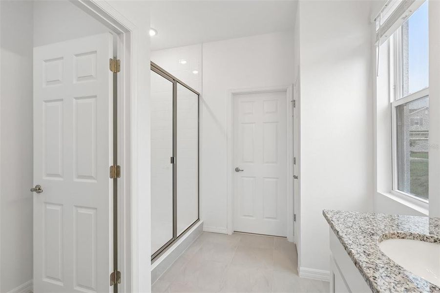 Furnished interior view inside a new home in Eagletail Landings, Howey-in-the-Hills (Image 9).
