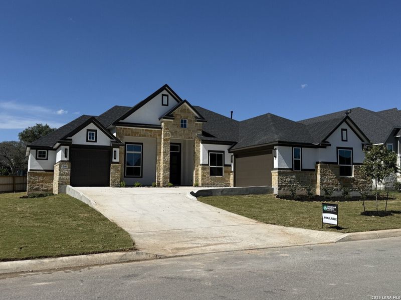 Front exterior of a new home in , Castroville, TX, highlighting curb appeal (Image 8). Front exterior of a new home in , Castroville, TX, highlighting curb appeal (Image 8).