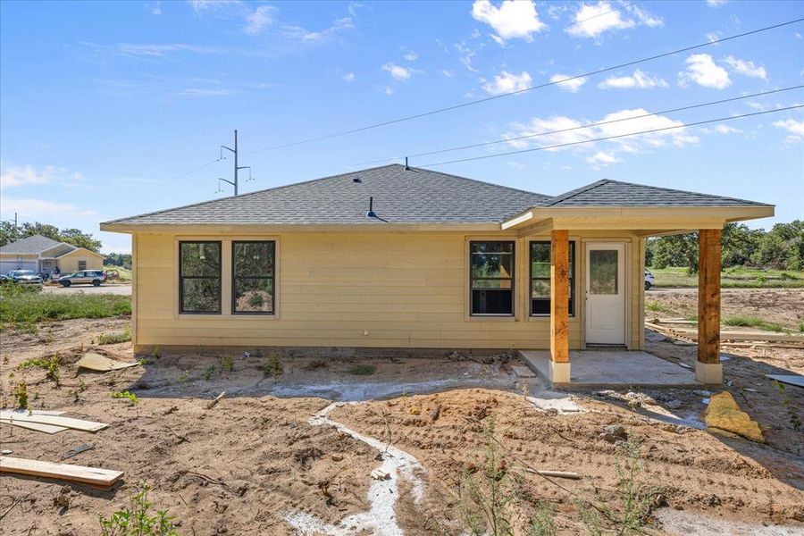 Front exterior of a new home in , Tolar, TX, highlighting curb appeal (Image 18). Front exterior of a new home in , Tolar, TX, highlighting curb appeal (Image 18).