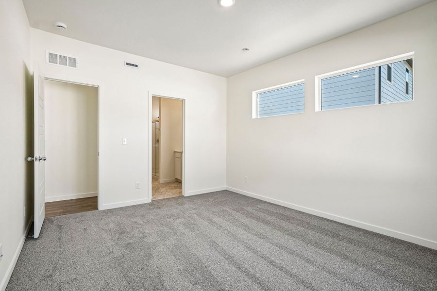 Spacious, unfurnished interior of a new home in Union Colony West, Greeley (Image 26).