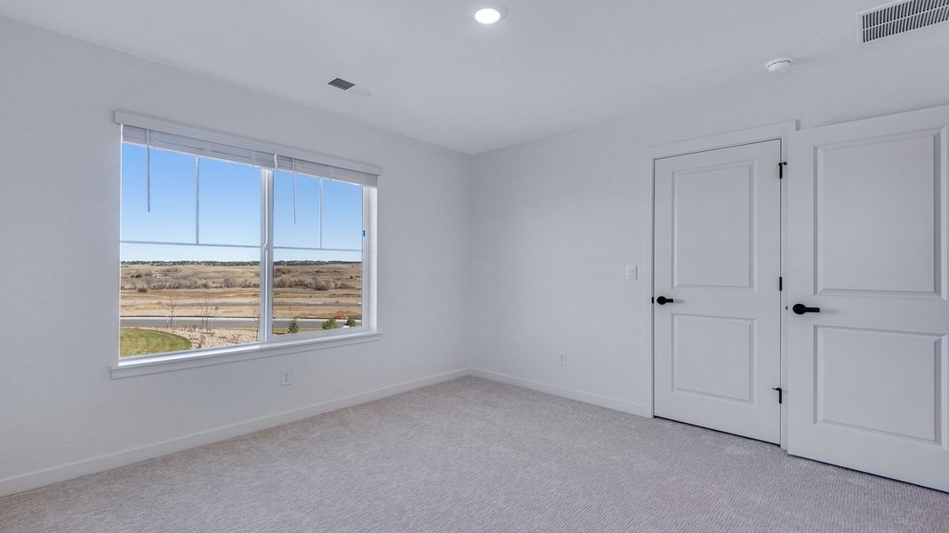 Spacious, unfurnished interior of a new home in Vista Meadows, Fort Lupton (Image 29).