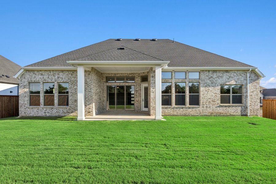 Exterior details and patio area of a home in Northshore at Lakewood Village - Garden Series, Lakewood Village (Image 3). Exterior details and patio area of a home in Northshore at Lakewood Village - Garden Series, Lakewood Village (Image 3).