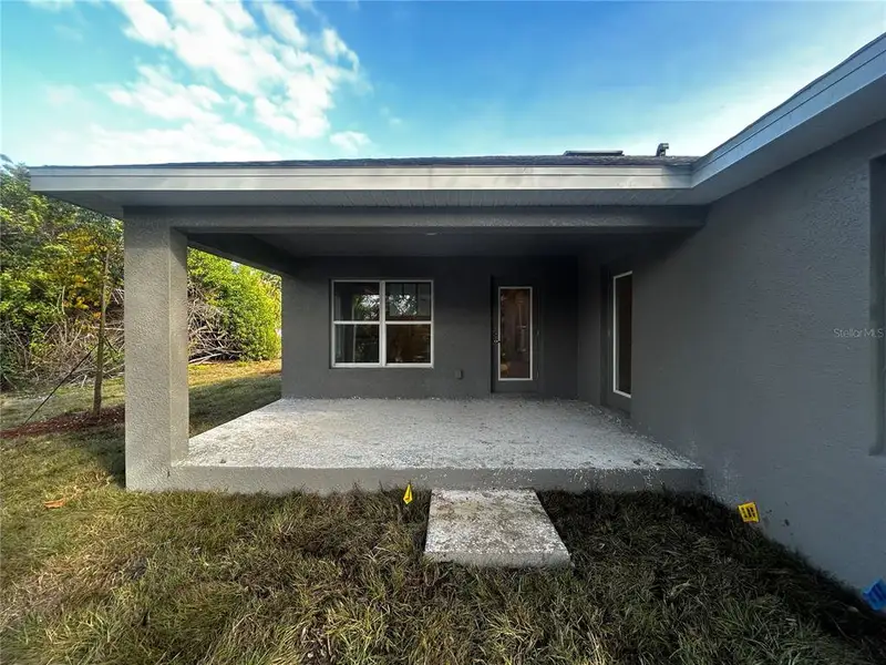Exterior details and patio area of a home in Port Charlotte, Punta Gorda (Image 3).