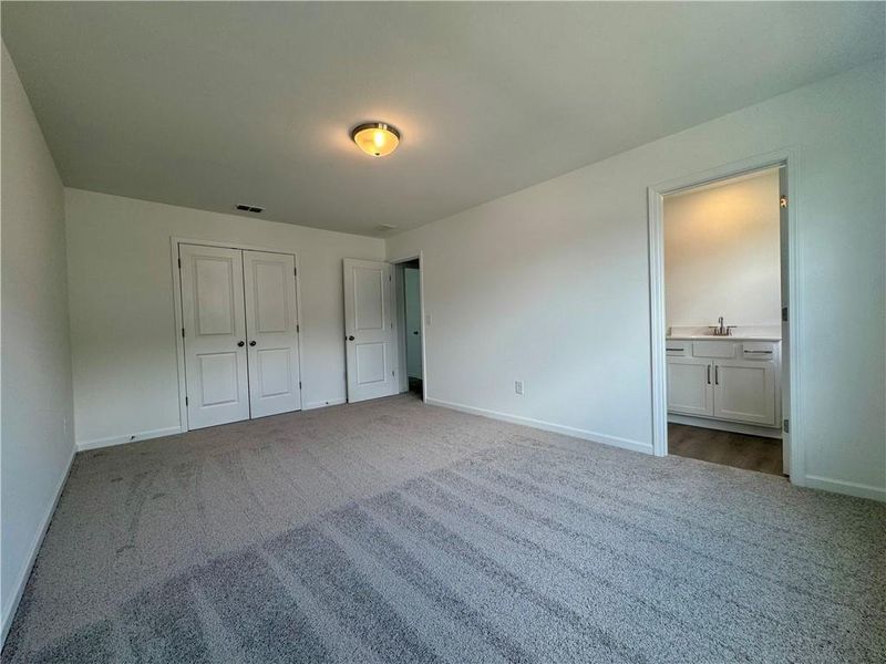 Spacious, unfurnished interior of a new home in Eastlyn Crossing - Single Family, Flowery Branch (Image 41). Spacious, unfurnished interior of a new home in Eastlyn Crossing - Single Family, Flowery Branch (Image 41).