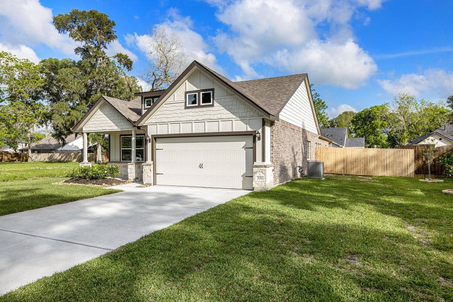 Front exterior of a new home in , West Columbia, TX, highlighting curb appeal (Image 17).