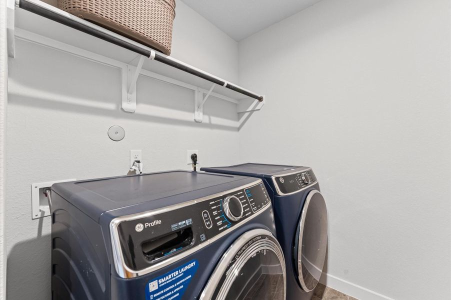 Laundry room conveniently located on the second floor. Laundry room conveniently located on the second floor.
